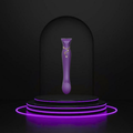 A purple curved handheld personal massager with a small gold decorative accent, displayed on a black tiered platform with glowing purple neon rings against a dark background.